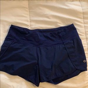 Size 4 lululemon 4” long Navy shorts